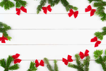 Christmas greeting card background with copy space on white wooden background