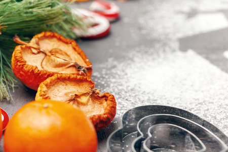 Dried fruit slices with cookies close up on kitchen tableの写真素材