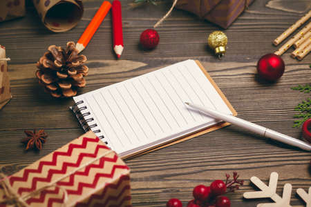 Getting ready for christmas, wrapping gifts and making decorationsの写真素材