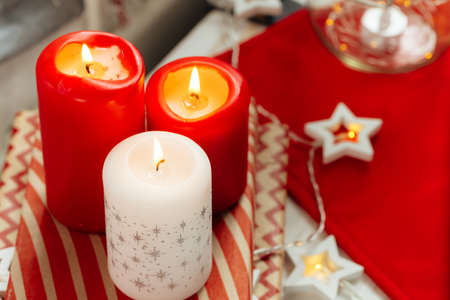 Red and white Christmas candles interior decorationの写真素材