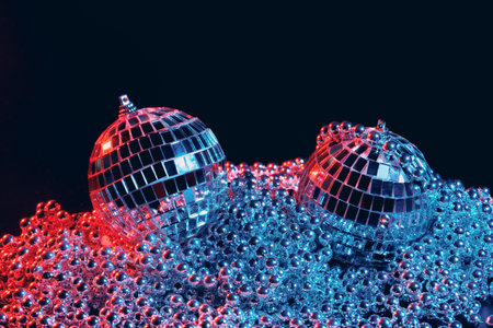 Party lights disco mirror balls on black backgroundの写真素材