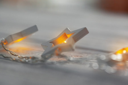 Star-shaped light garlands, festive decoration for Christmasの写真素材