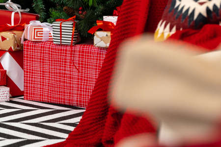Pile of wrapped presents under the Christmas tree