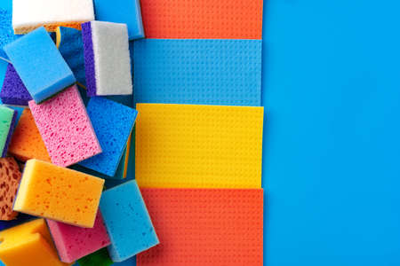 House cleaning supplies on blue color backgroundの写真素材