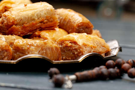Plate of baklava dessert close up served on table