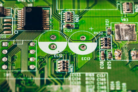 Green circuit board of a computer close up