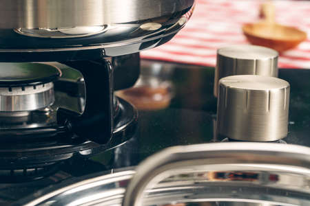 Clean saucepan on a gas stove in kitchenの写真素材