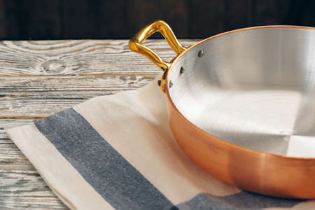 New copper cookware for professional kitchen close upの写真素材