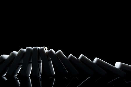 White dominoes in the dark close upの写真素材