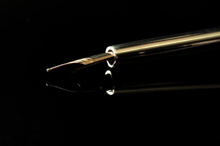 Close up of a pen on black background