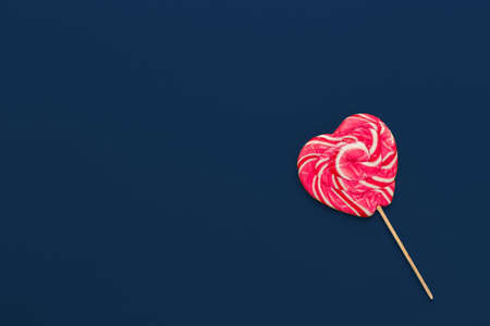 Colorful candy on classic blue background top viewの写真素材
