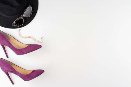 Female fashion accessories on white background, view from aboveの写真素材