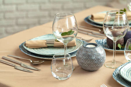 Table setting in restaurant with stylish decorations