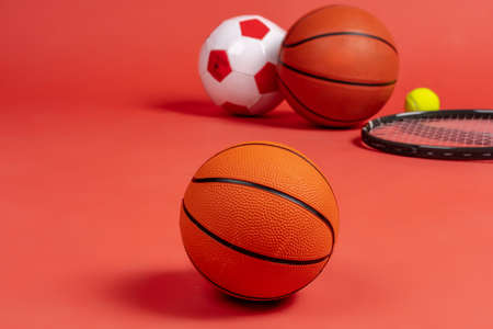Sport equipment flat lay. Variety of rackets and balls