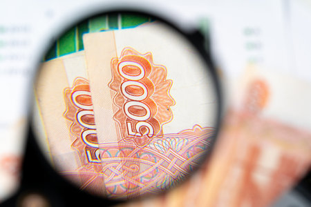 Magnifying Glass on the Russian Currency Rubles