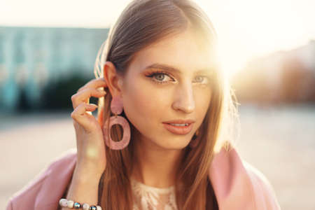 Close up portrait of a woman walking in the streetの写真素材