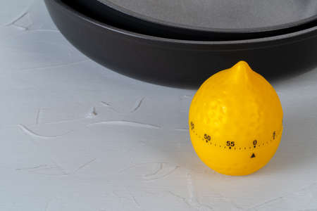 Clean and dry cooking pans on a kitchen counterの写真素材