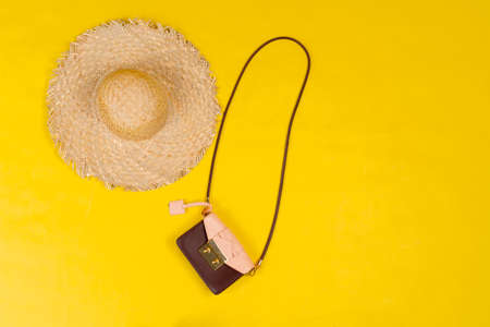 Set of female clothes and accessories on bright yellow backgroundの写真素材