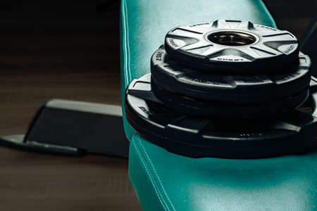 Weight plates in a gym, powerlifting equipmentの写真素材