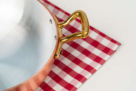 Clean cookware, utensils close up on table in modern kitchenの写真素材