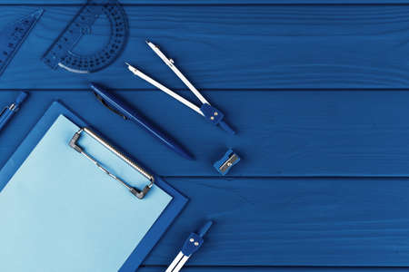 Classic blue colored top view photo of scattered stationeryの写真素材