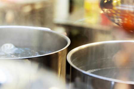 Khinkali boiling in a stainless steel cooking potの写真素材