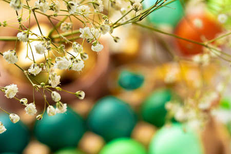 Many Easter eggs decorated with floral branchesの写真素材