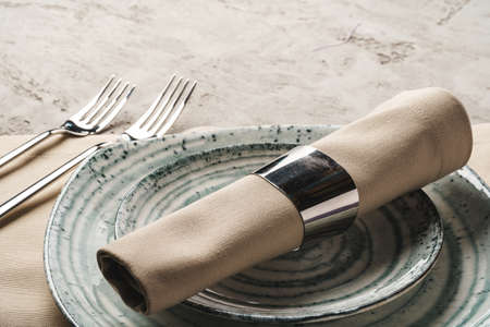 Ceramic stylish tableware set on grey background