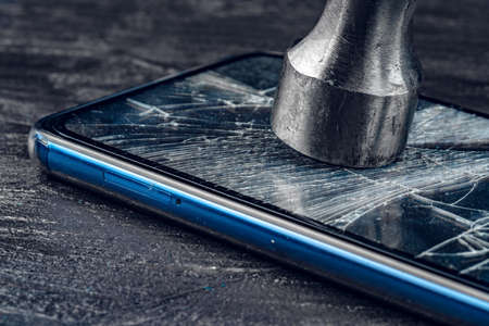 Digital gadget with tools. Repairing smartphone conceptの写真素材