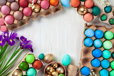 Many Easter eggs decorated with floral branches