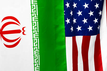 Flag of Iran together with flag of the United States of Americaの写真素材