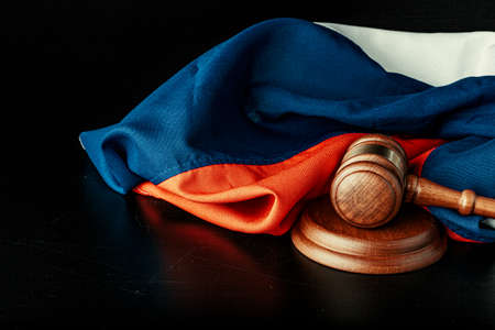 Russian justice. Wooden gavel and russian flagの写真素材
