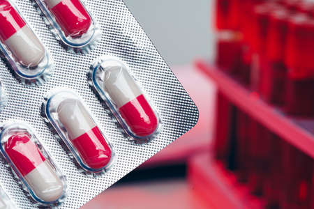 Medicine pills on white table for medical concept