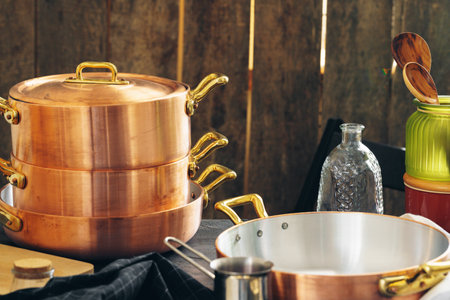 Clean copper cookware in kitchen close upの写真素材