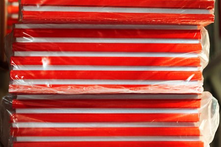 Cardboard sheets pack on a shelf of warehouseの写真素材