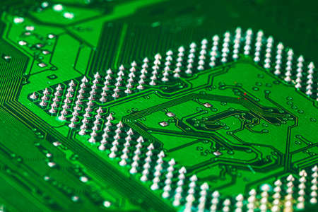 Green circuit board of a computer close upの写真素材