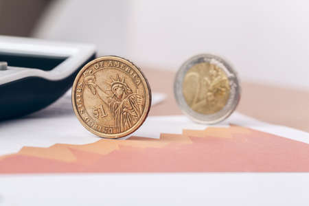 Macro shot of unrecognizable coins stacked close upの写真素材