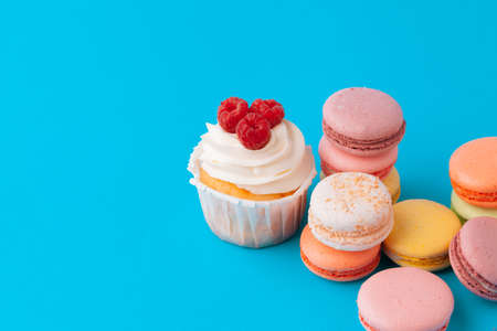 Set of various fondant cupcakes ready to be eaten - bright and colorful setの写真素材