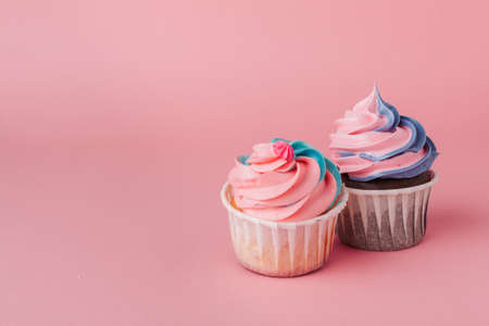 Yummy cupcake on light pink background close upの写真素材