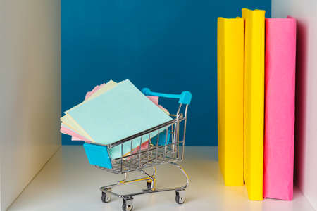 books on a wooden shelf at home or office