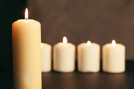 Candle flame close up on a black backgroundの写真素材