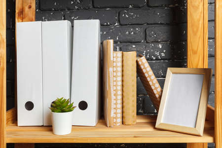Image of wooden board with documents in office