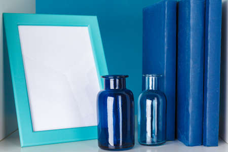 White office shelves with different stationery, close upの写真素材