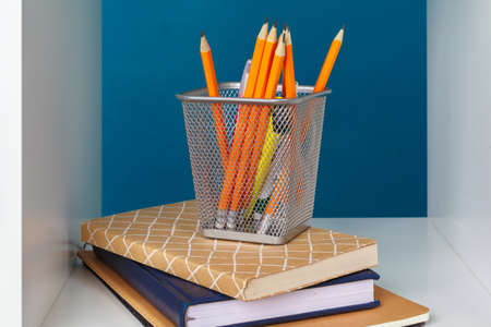 books on a wooden shelf at home or officeの写真素材
