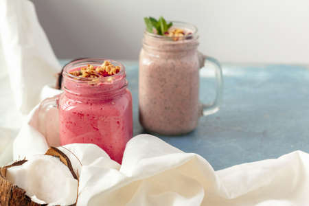 Granola with yogurt and berries for healthy breakfast on a table