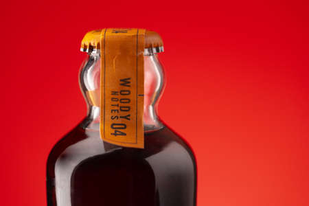 KRASNODAR, RUSSIA - OCTOBER 12, 2020: Close up of glass bottle of Coca-Cola Woody notes Signature Mixersのeditorial素材