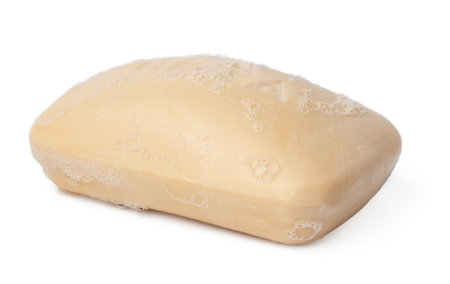 Yellow soap bar isolated on white backgroundの写真素材