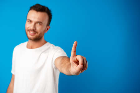 Close up of a man hand pointing at cameraの写真素材
