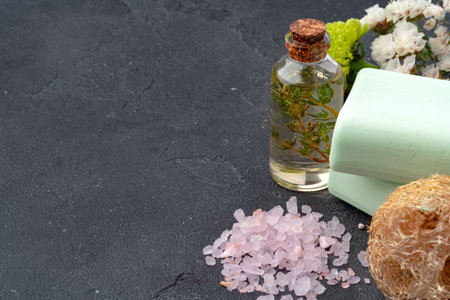 Skincare organic soap bars with plants extracts on gray surface.の写真素材