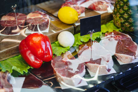 Fresh raw good quality meat on counter in Butcher shopの写真素材